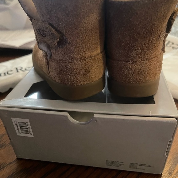Ugg boots gently used with a stain. - Picture 4 of 7